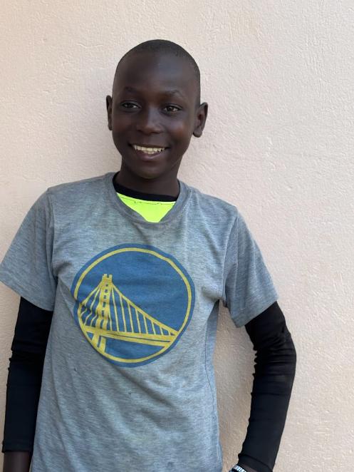 Arnold, age 13, at Mark of Hope International in Uganda