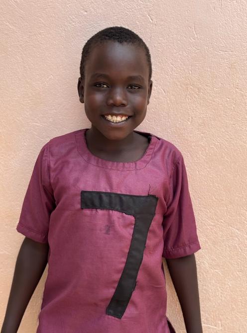 Elvis Mark, age 9, at Mark of Hope International in Uganda
