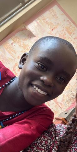 Marion, age 12, at Mark of Hope International in Uganda